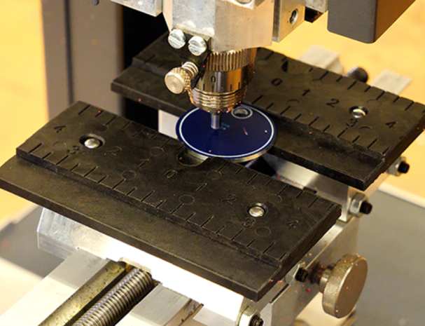 Rotary engraver for gift engraving, small signage and retail personalization.